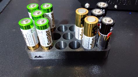 AA Battery Holder by Vookimedlo .